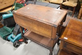 A Priory style dark stained tea trolley