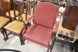 A hardwood framed armchair