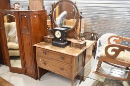 An early 20th Century oak dressing table, Arts and Crafts influences