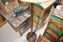 A traditional oak standard lamp