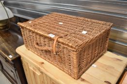 A wicker picnic basket