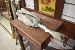 A small boat or similar anchor
