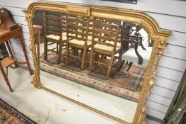 An antique gilt framed over mantel mirror, width approx. 142cm