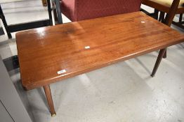 A vintage teak coffee table