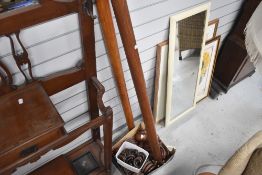 Two Victorian mahogany curtain poles and accessories