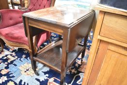 An early to mid 20th Century stained frame tea trolley