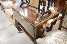 An early 20th Century oak tea trolley