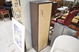A metal gun cabinet , wide proportions