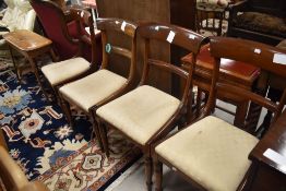 A set of four Victorian mahogany rail back dining chairs, signs of some past worm