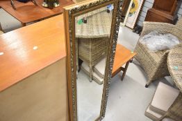A vintage full length gilt frame wall mirror