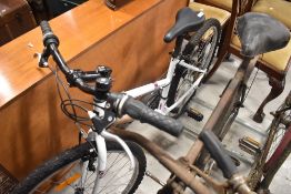 A BTWin 5.0 rockrider hard tail mountain/trail bike