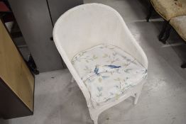 A woven fibre tub chair