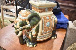 A traditional ceramic elephant garden seat