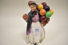 A Royal Doulton figurine, Biddy Pennyfarthing HN1843. AF.