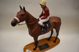 A Beswick figure of Red Rum with Brian Fletcher UP2511