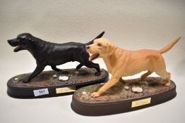 Two Beswick studies, The Labrador, both on ceramic bases, black and golden 3062A