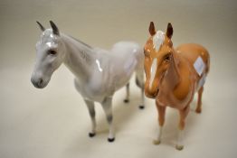Two Beswick studies, Imperial, grey & palomino 1557, small chip to palomino hoof