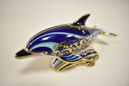 A Royal Crown Derby bottlenose dolphin study,having silver stopper.