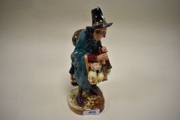 A Royal Doulton figure,The mask seller,HN2103,unboxed.