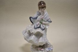 A limited edition figure by Coalport titled Visiting day 8348 of 9500