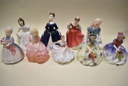 Nine Royal Doulton figures, Debbie, Amanda, Alice, Rose, The Rag Doll, Fair Maiden, Ninette,