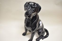 A large Beswick fire side labrador, 2314 impressed to underside.