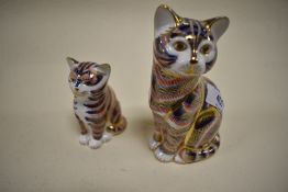 Two Royal crown Derby cat studies,gold stopper to larger and silver stopper to the smaller.
