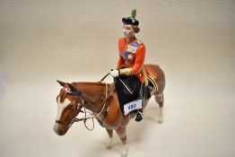 A Beswick figure of HM Queen Elizabeth 2 trooping the colour 1546 having had restoration