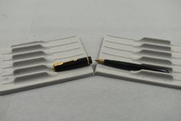 A Parker Slimfold fountain pen in black with single decorative band to cap with Parker 5 nib. Approx