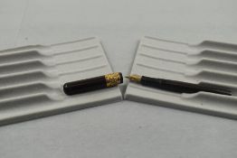 A Mabie Todd Swan 2B clipless eyedropper fountain pen in black chaised hard rubber with very broad