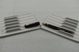 A Waterman Junior leverfill fountain pen in black with single narrow band to cap having Waterman