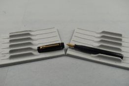 A Croxley leverfill fountain pen in black with single band to the cap having a Dickinson nib. Approx