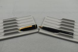 A Conway Stewart Conway 150 fountain pen in black with one narrow band to the cap having a Conway