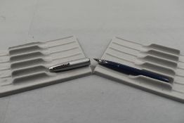 A Sheaffer Imperial II Deluxe Touchdown fountain pen in dark blue with brushed steel cap. Approx