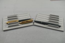 A Parker 51 fountain pen and propelling pencil set in grey with gold cap