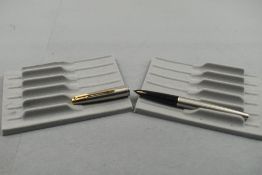 A Parker 61 Flighter Deluxe converter fill fountain pen with stainless steel cap with gold trim.