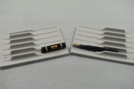 A Mabie Todd Swan 292 41 leverfill ladies fountain pen in black with two decorative bands to the cap