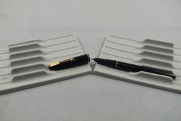 A Parker 17 fountain pen in black with narrow band to the cap. Approx 13.2cm