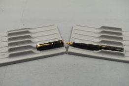 A Mabie Todd Swan 6161 leverfill fountain pen in black with single band cap and band to rim of cap(