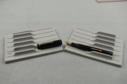 A Mentmore Auto Flow leverfill fountain pen in black with single band to the cap having Mentmor Osmi