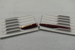 A Mentmore Diploma leverfill fountain pen in burgundy with single broad band to the cap. Approx 12.