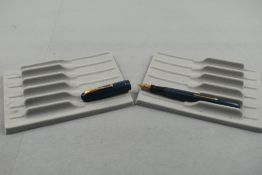 A Mabie Todd Swan 3170 leverfill fountain pen in blue with single narrow band to the cap having a