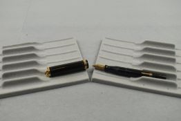 A Conklin Endura leverfill fountain pen in black having ring top cap with single broad band with