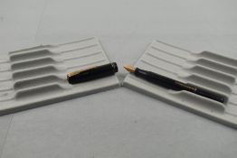 A Waterman Stalwart leverfill fountain pen in black with two narrow bands to the cap having