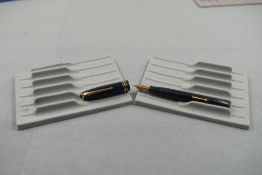 A Conway Stewart 58 leverfill fountain pen in blue herring bone design with single broad band and