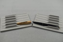 A Parker 61 in black with gold cap. Approx 13.3cm