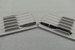 A Waterman Ideal fountain pen in black with steel cap with Waterman 14k nib. Approx 13.9cm