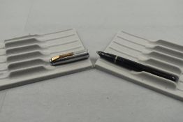 A Mentmore 46 fountain buttonfill fountain pen in black with steel ribbed cap. Approx 13.4cm