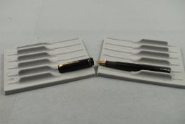 A Mabie Todd Swan 6260 leverfill fountain pen in black with two bands to the cap having Swan 2