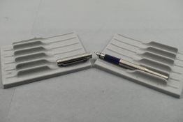 A Parker 25 flighter cartridge/ converter fountain pen in brushed steel. Approx 13.1cm